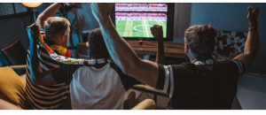 Did Americans watch sporting events at home, in person, or at the bar in 2024?